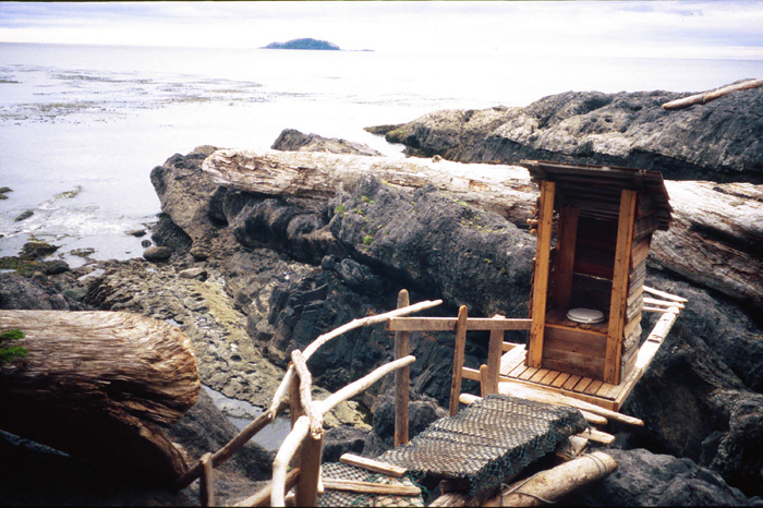 An outhouse with a view, which flushes twice a day. Queen Charlotte Islands in British Columbia Canada. ©Chris Kolaczan/500px